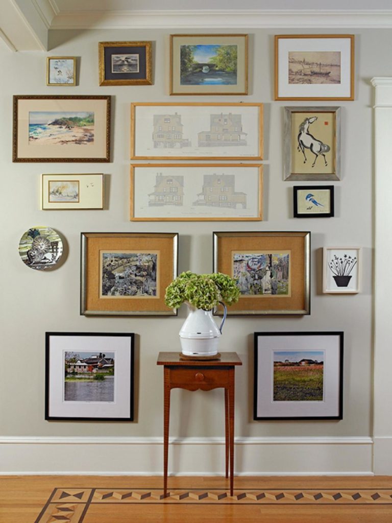Decorating a poised taupe wall ilevel
