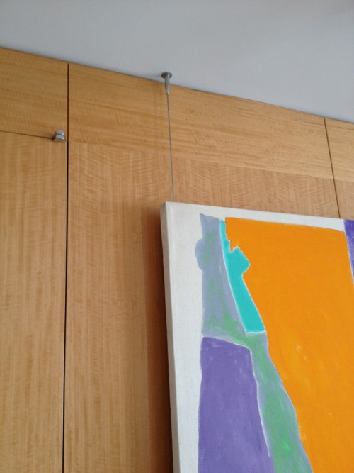 hanging art from a cable system