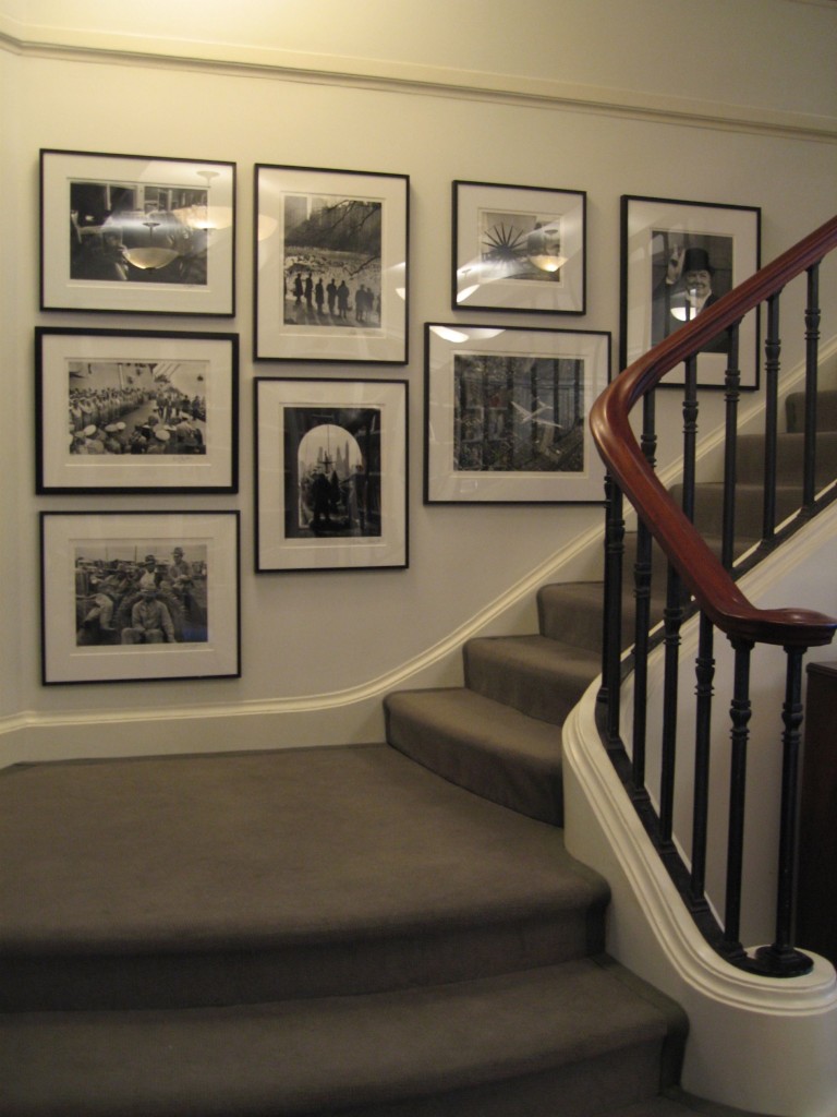 gallery wall stairway black and white