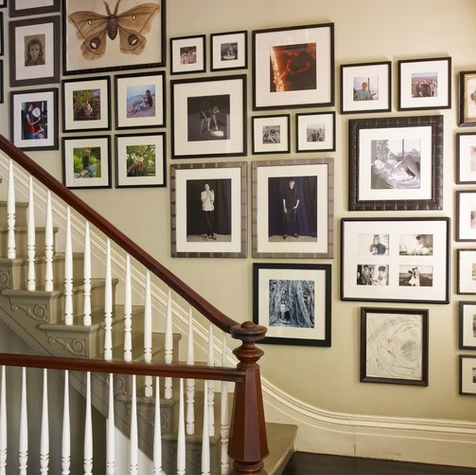 hanging art on a stairway