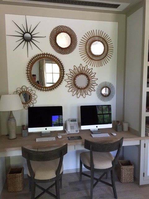 rattan mirrors in a home office space