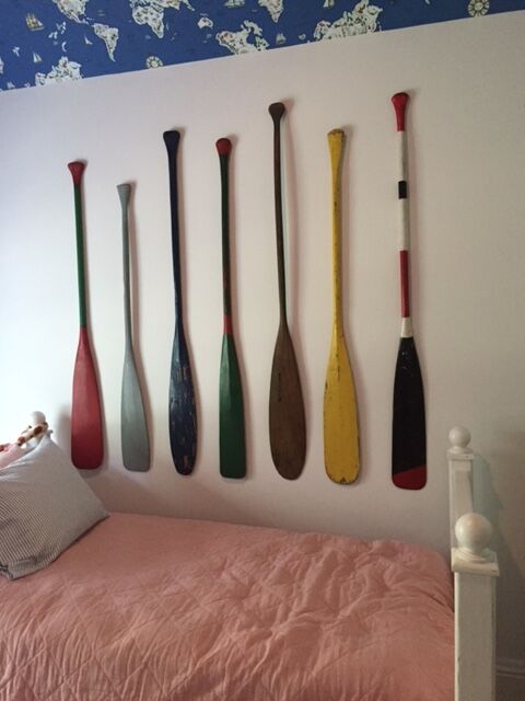oars hanging on wall