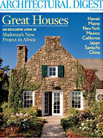 Cover of Architectural Digest Magazine, Headline reads: great homes and the photo shows a beautiful stone house
