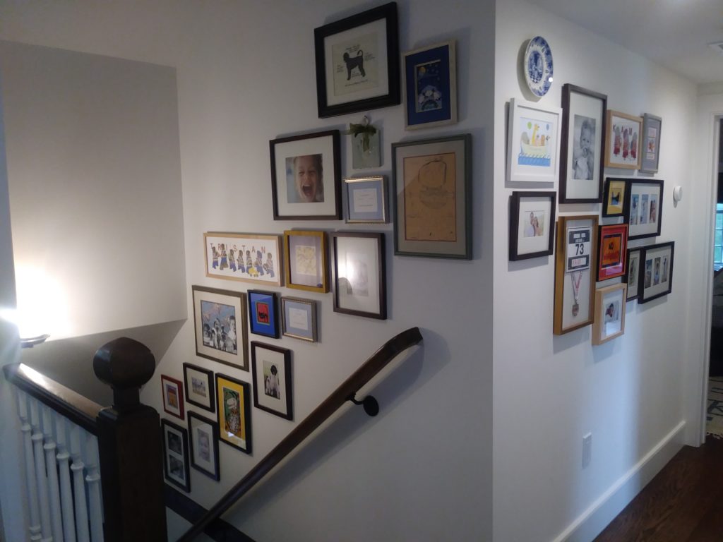 Hanging Art Up the Stairs with NYC's Best Professional Art Installation