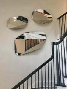 A sculptural installation of 3 faceted mirrors by ILevel