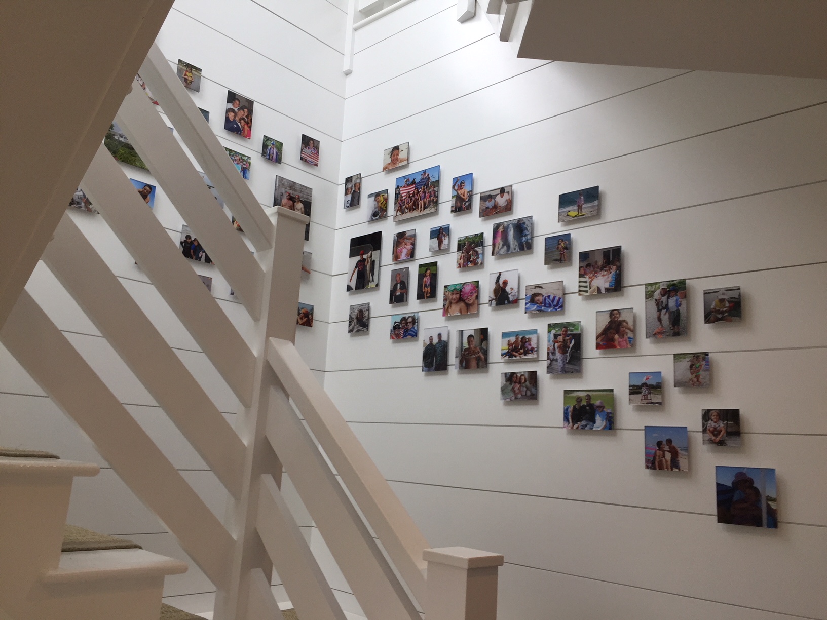 Hanging Art Up the Stairs with NYC's Best Professional Art Installation