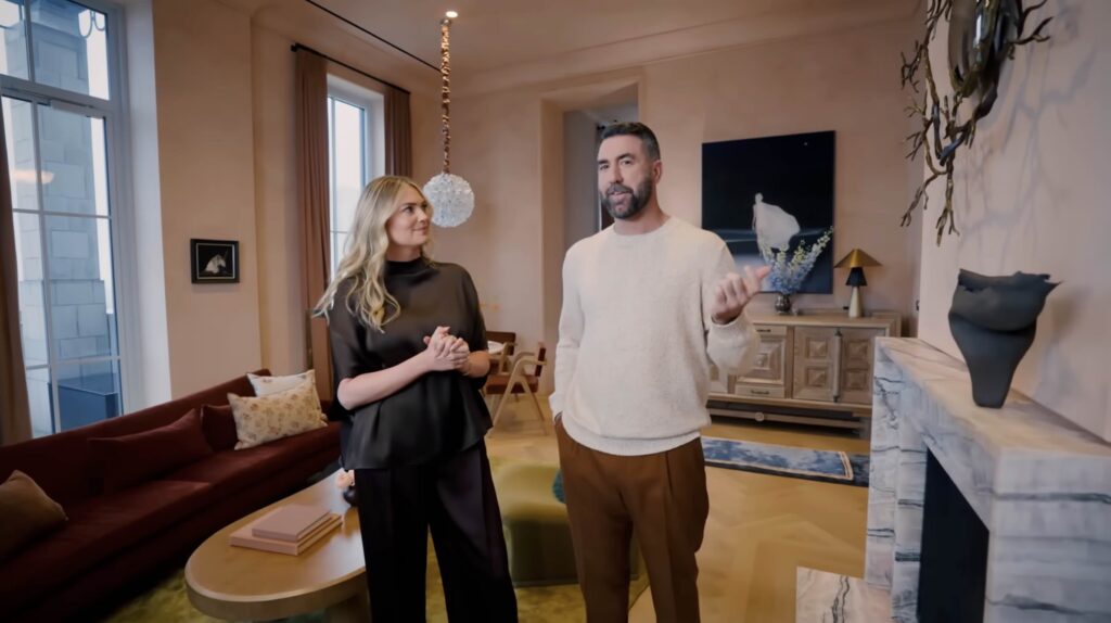 Kate Upton and Justin Verlander in the living room of their NYC penthouse, as featured in Architectural Digest April 2026