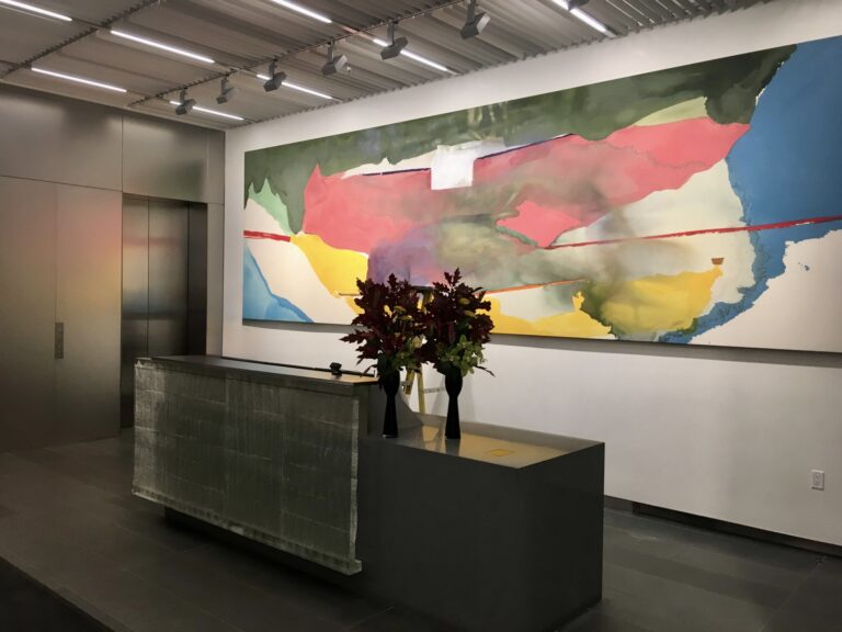 large art hung in corporate environment