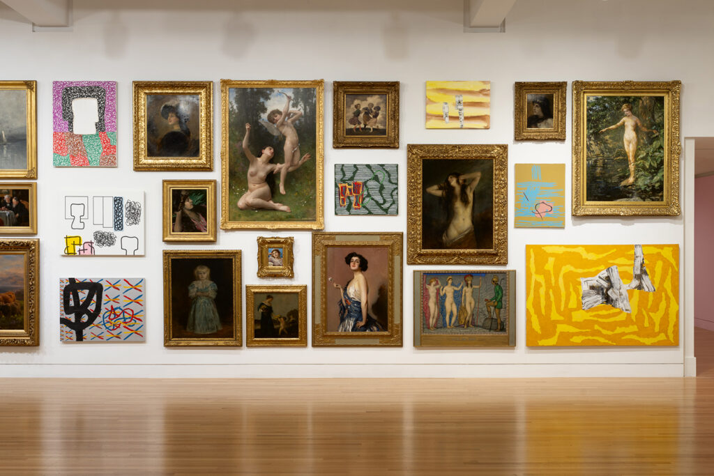 Salon style art installation comprising old and new paintings