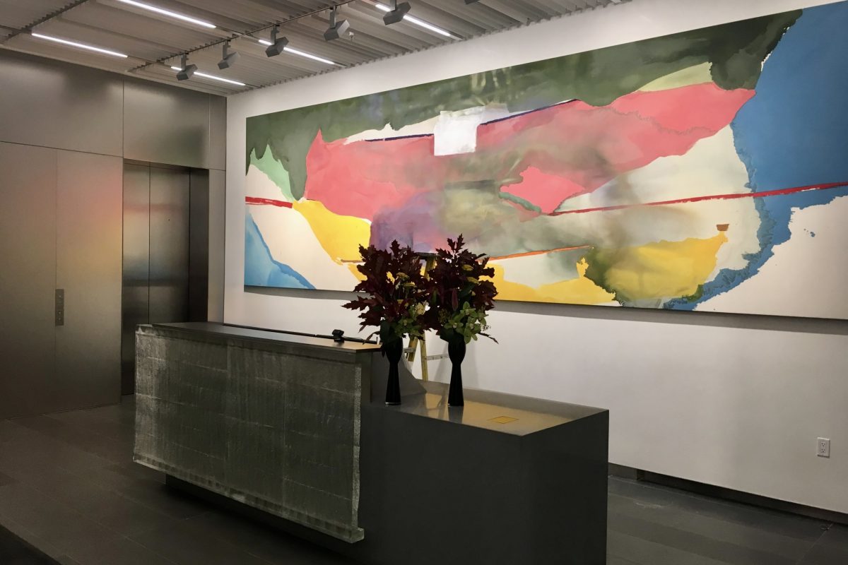 large art hung in corporate environment